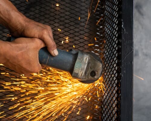 male-workers-cut-weld-metal-with-spark_1150-14762