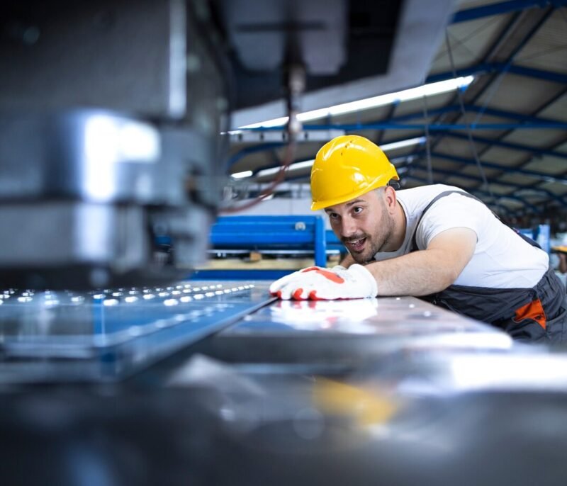 factory-worker-protective-uniform-hardhat-operating-industrial-machine-production-line_342744-218 factory-worker-protective-uniform-hardhat-operating-industrial-machine-production-line_342744-218