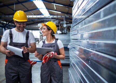 factory-workers-walking-industrial-plant-discussing-about-production-efficiency_342744-236
